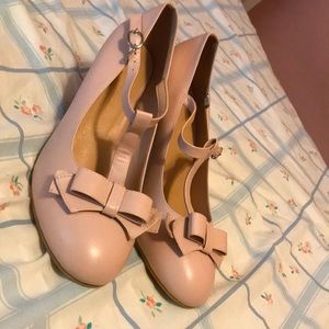 Pink buckle bow pumps
